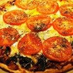 Pizza on the grill using chili oil