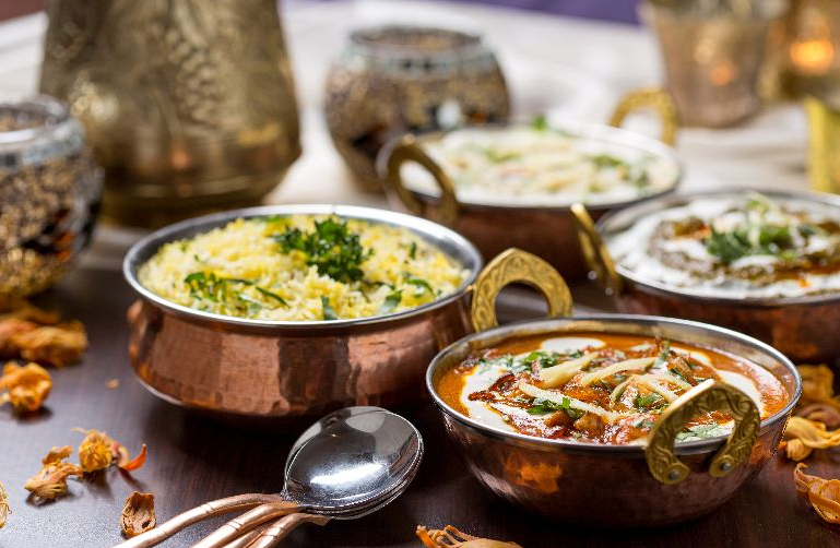 Moroccan Style Vegetable Stew with Harissa Yogurt Sauce