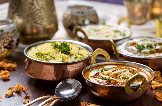 Moroccan Style Vegetable Stew with Harissa Yogurt Sauce